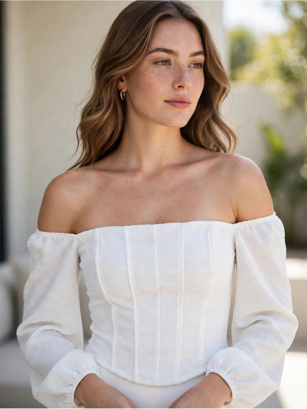 Women’s Boned, Ribbed, Sleeved, Roughed White Crop Top.